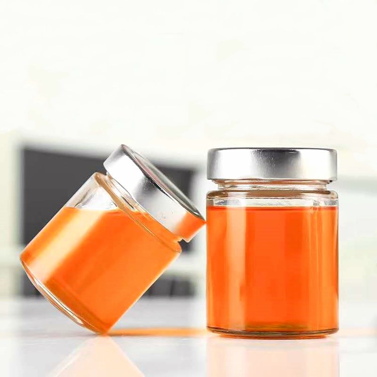 wholesale 100ml-500ml clear round straight side glass honey jars with metal lid