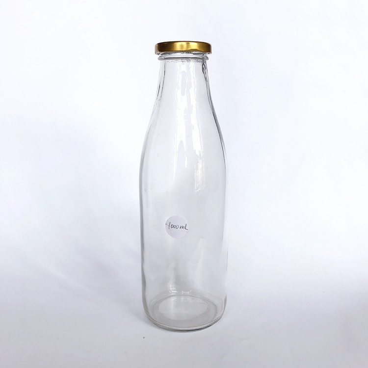 empty 1L clear glass milk bottle with metal lid