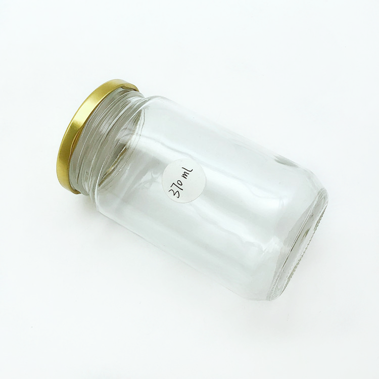 wholesale 370ml clear round glass container honey jar with metal lug cap