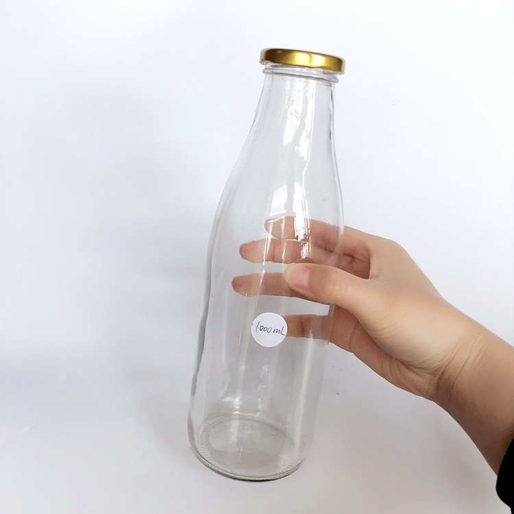 empty 1L clear glass milk bottle with metal lid