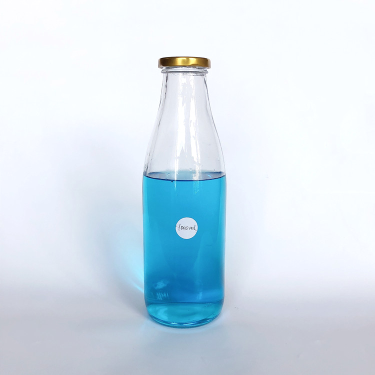 empty 1L clear glass milk bottle with metal lid