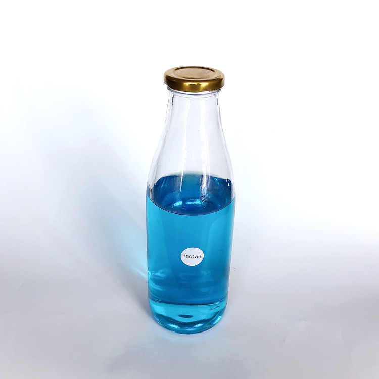 empty 1L clear glass milk bottle with metal lid