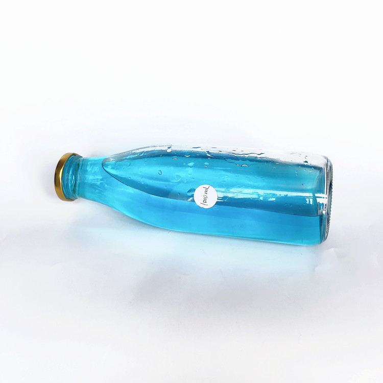 empty 1L clear glass milk bottle with metal lid