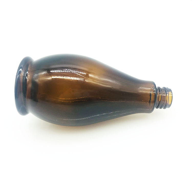 amber color essential oil bottle with cap