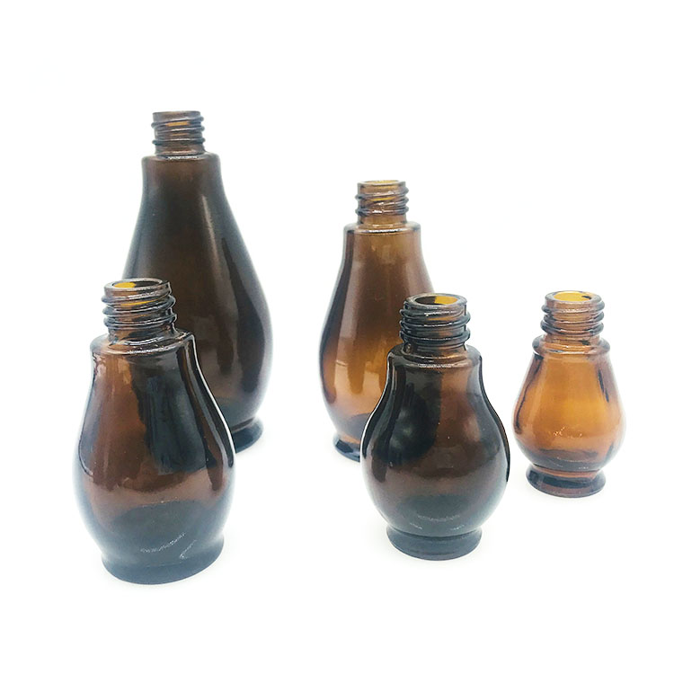 amber color essential oil bottle with cap