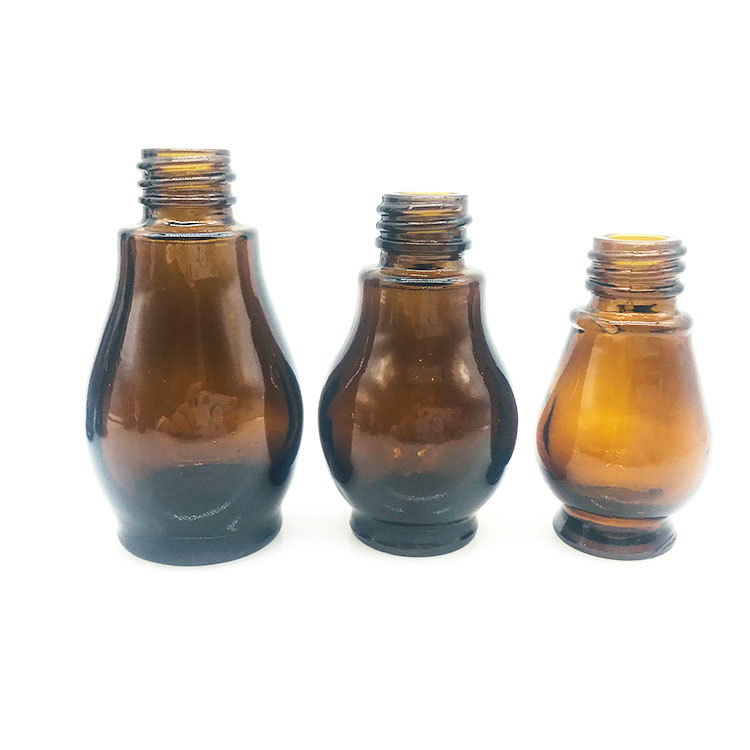 amber color essential oil bottle with cap