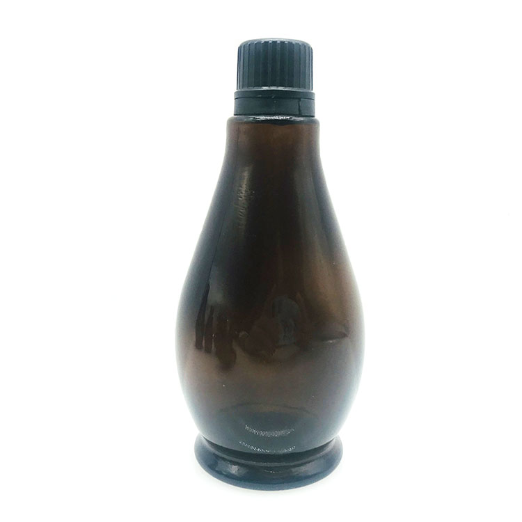 amber color essential oil bottle with cap