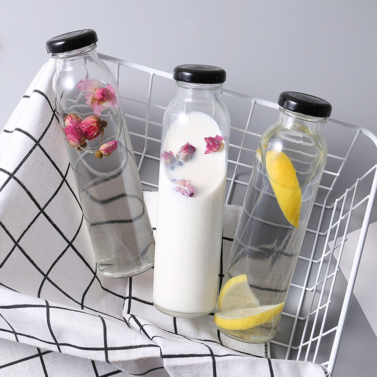 customize 300ml 500ml round glass drinking bottle for milk with lid