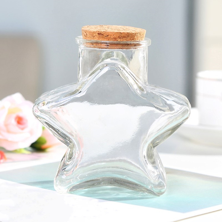 2oz 4oz 50ml 100ml star shape decorative small glass jar with cork lid wholesale