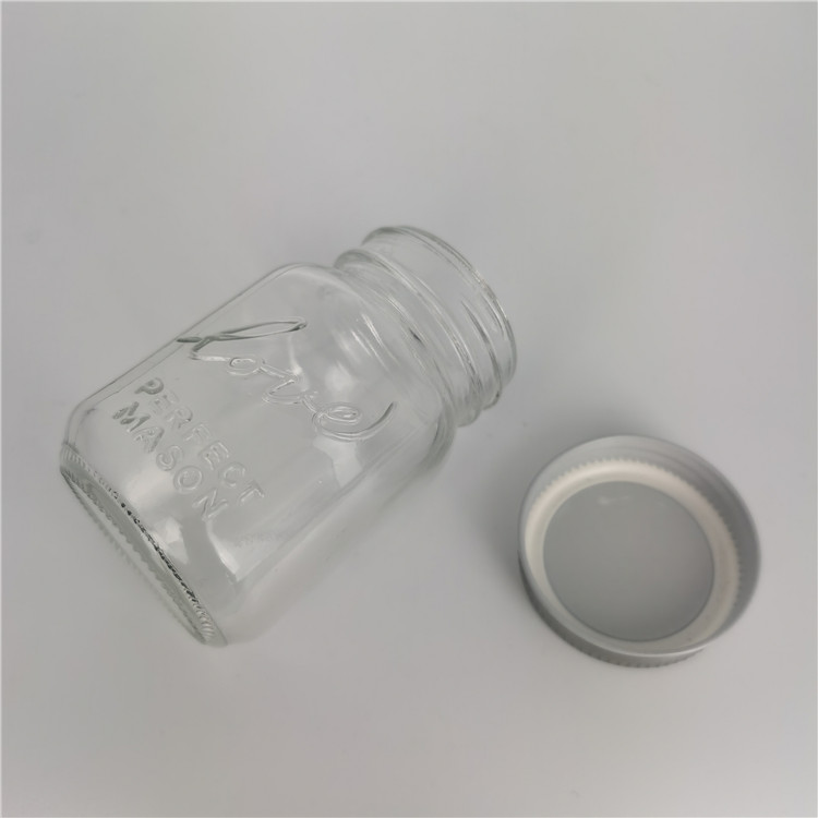 4oz 100ml mini cute glass mason jar with embossed logo silver lid bulk wholesale