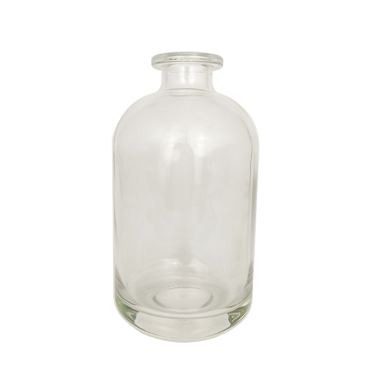 Wholesale 500ml round clear glass bottle for beverage with cork