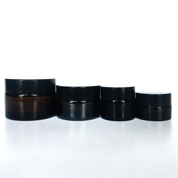 Custom 30ml 50ml 100ml 200ml amber glass cosmetic bottle for cream with black plastic cap