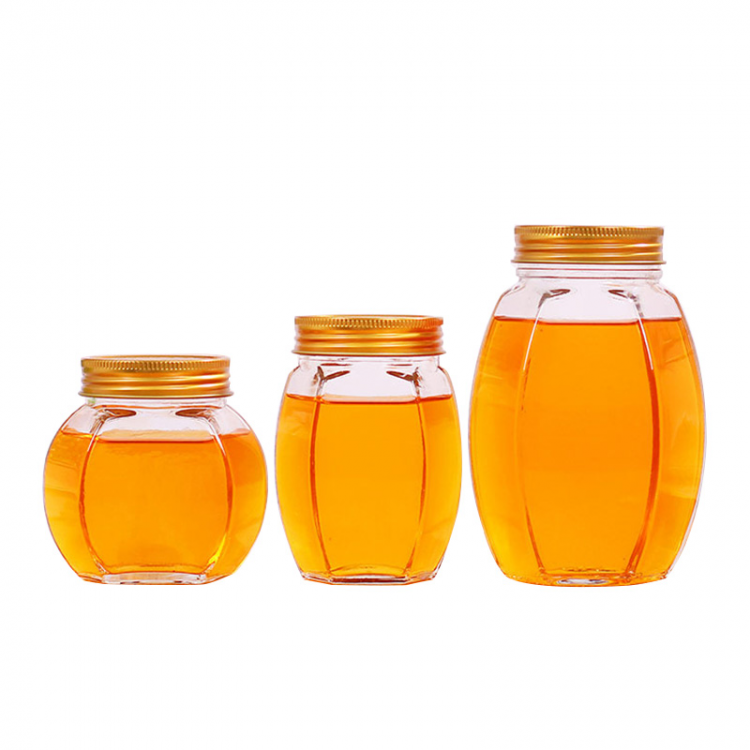 unique shape 500ml honey bottle glass hexagon honey jar with aluminum lid