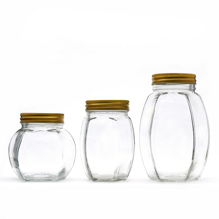 unique shape 500ml honey bottle glass hexagon honey jar with aluminum lid