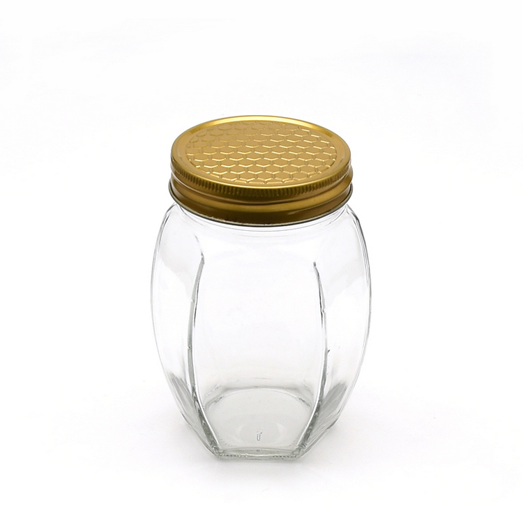 unique shape 500ml honey bottle glass hexagon honey jar with aluminum lid