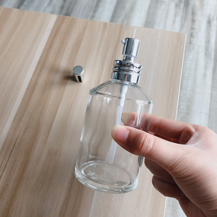 hot sale 15ml-200ml round cosmetic glass bottles with spray cap and pump