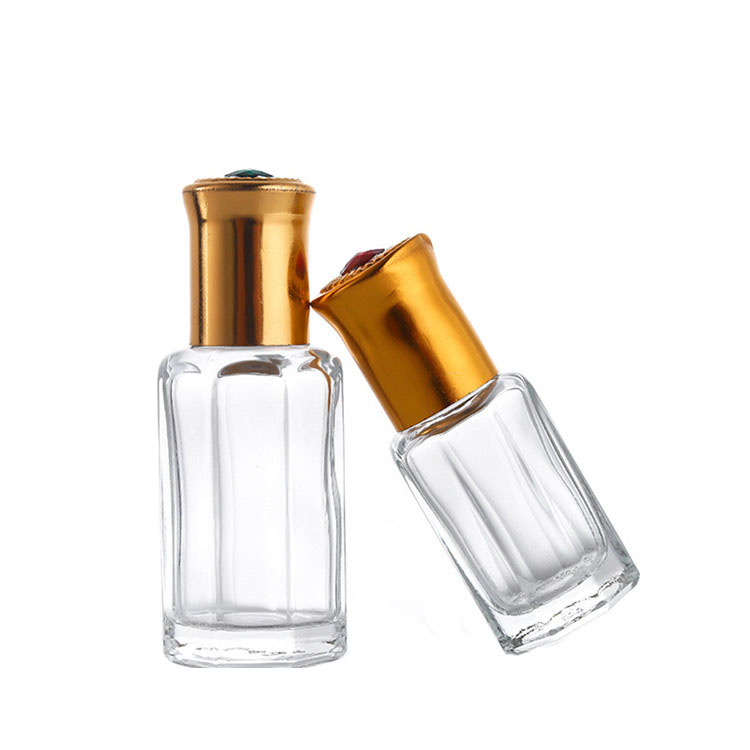 Wholesale empty essential oil perfume 10ml clear glass roll on bottle with metal roller ball