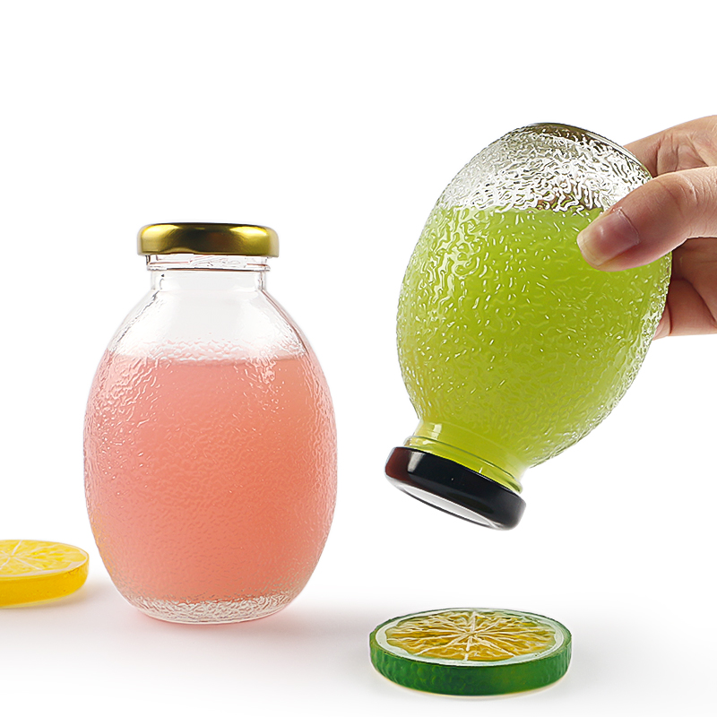 Hot Sale 250ml Ball shape Glass Beverage Bottle With Lid