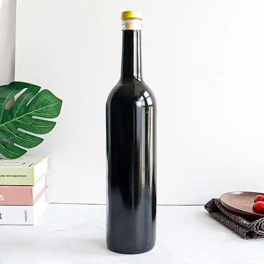 Manufacturer customize shinny black 750ml glass red wine bottles with cork