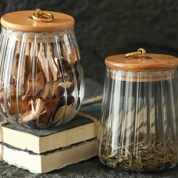 Wholesale 650ml 750ml glass candy tea spice jar petals pumpkin shape glass food container with bamboo lid