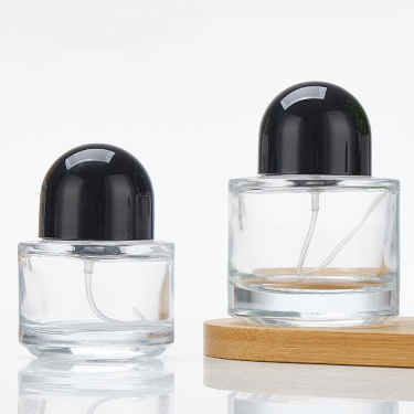 Wholesale round shape transparent thick bottomed 30ml 50ml 100ml spray perfume glass bottle with semi-circular cap