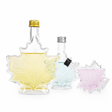 Transparent Maple Leaf Shape Vodka Tequila Wine Liquor Spirit Glass Bottle with Color Metal Lid