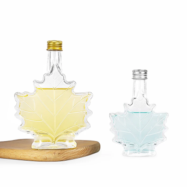 Transparent Maple Leaf Shape Vodka Tequila Wine Liquor Spirit Glass Bottle with Color Metal Lid