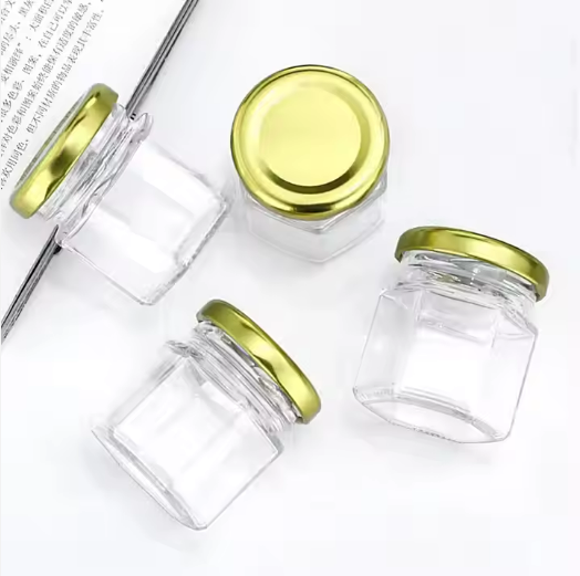 Wholesale45ml 85ml 100ml 180ml 280ml 380ml 500ml 730ml Hexagonal and other shapes Glass Jam Jar for Honey with Metal Lid