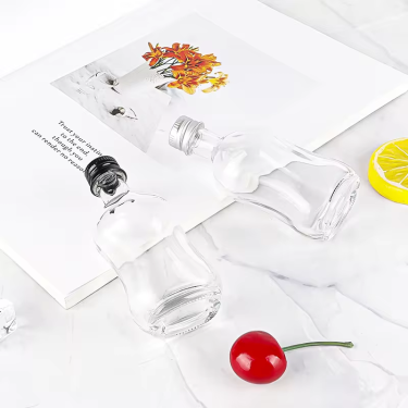 Wholesale 50ml Mini Empty Clear Glass Liquor Wine Bottle Whisky Vodka Spirit Glass Bottle with Aluminum Caps