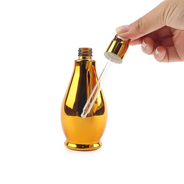 Wholesale 5ml 10ml 15ml 30ml 50ml 100ml Electroplate Golden Essential Oil Glass Dropper Bottles Custom Color Glass serum bottle