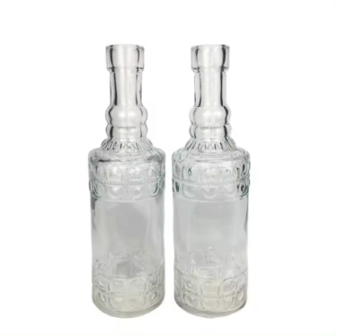 Wholesale 145ml empty emboss clear glass wine bottle for beverage