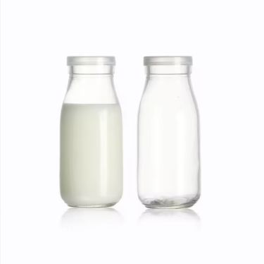 Cheap price 250ml clear glass milk bottles with metal lids wholesale