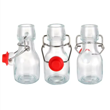 2oz 50ml 60ml Empty Mini Flip Top Bottle Clear Swing Top Glass Bottles for Juice Beverage with Cap