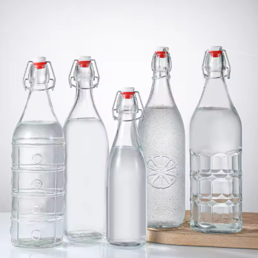 Clear Embossed Beer Glass Bottles With Airtight Rubber Seal Flip Caps 1000ml Swing Top Bottles for Beverages