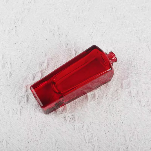 New arrivals 50ml cone design red color glass perfume bottles with pump sprayer