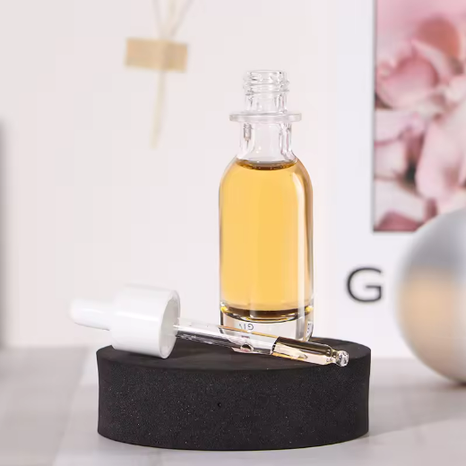 New arrival 30ml cylinder cosmetic packaging essential oil bottles  glass dropper bottle with lid