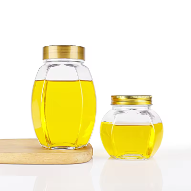 Wholesale 380ml 730ml jam honey food packaging transparent hexagon glass bottle jar with screw cap