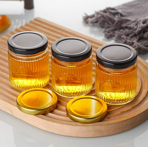 150 200 280 380 500ml wholesale emboss design glass honey jar with lid