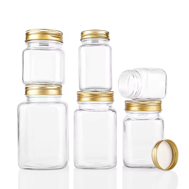 Wholesale High Quality 100ml 200ml 280ml 380ml 500ml 730ml Clear Empty Square Glass Food Storage Jar with Aluminum Cap