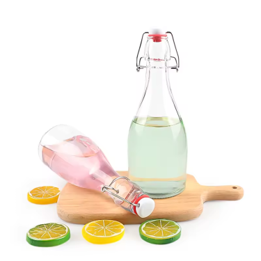 High quality transparent airtight 330ml 520ml glass juice milk beverage bottle with swing top lid