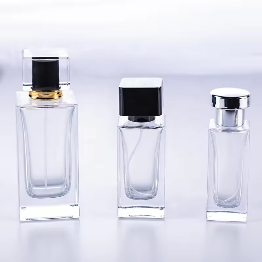 Popular recently flat shoulder crimp sprayer neck 50ml empty square glass bottle perfume packaging with 3 types of lids