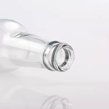 Wholesale 330ml transparent empty soda soft drinking beverage beer glass bottle with pull ring lid