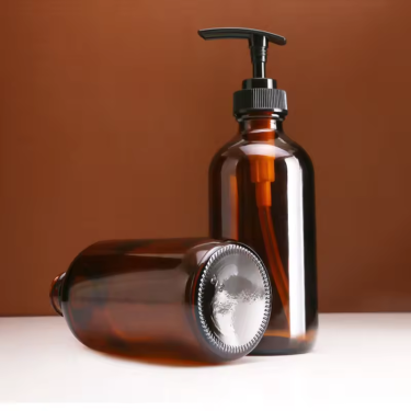 amber round glass bottle with pump