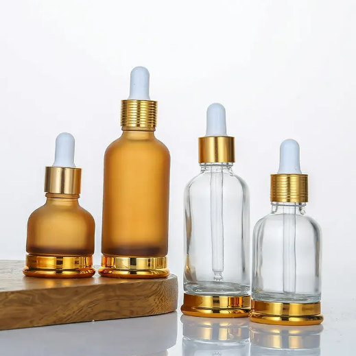 Luxury Gold Transparent 20ml 30ml 50ml Cosmetic Spray Lotion Glass Packaging Essential Oil Dropper Bottle