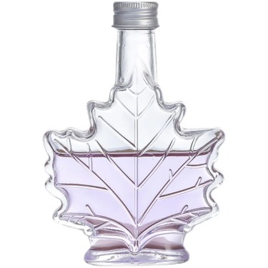 Maple leaf shaped glass beverage bottle