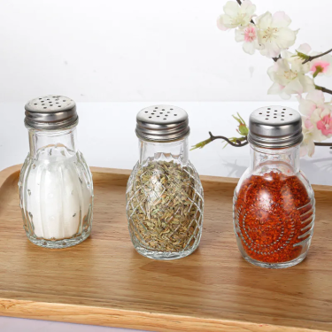 Wholesale Kitchen Seasoning Storage Embossing Glass Container 100ml Glass Shaker Bottles