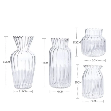 small vintage style transparent glass bud vase with ribbed line