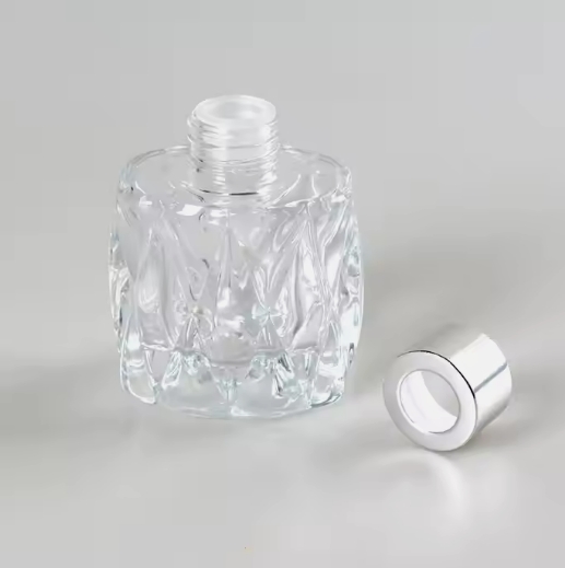 Unique style 100ml clear glass aroma reed perfume diffuser bottle with screw lid