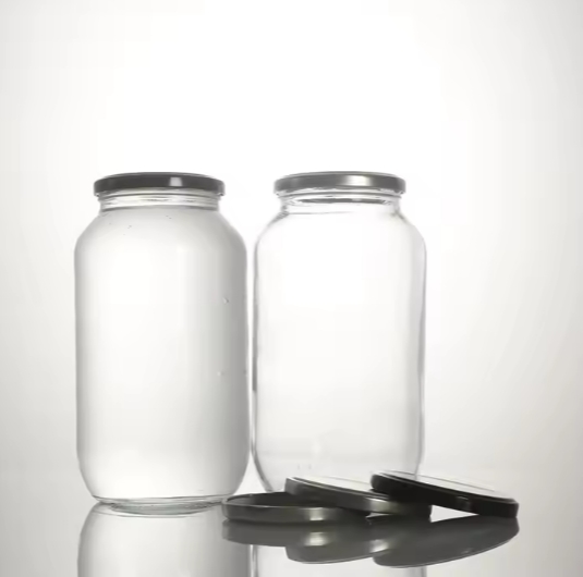 Wholesale stocked 500ml 1000ml 1L 1.5L heat resistant recycled clear glass food storage mason jar for coconut oil Peanut butter