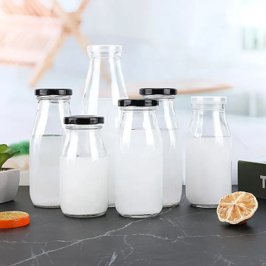 Wholesale Clear Empty 200ml to 1000ml Yogurt Juice Milk Glass Bottles With Screw Lid